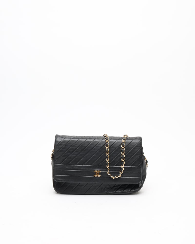 CHANEL Diagonal Quilted Single Flap Bag