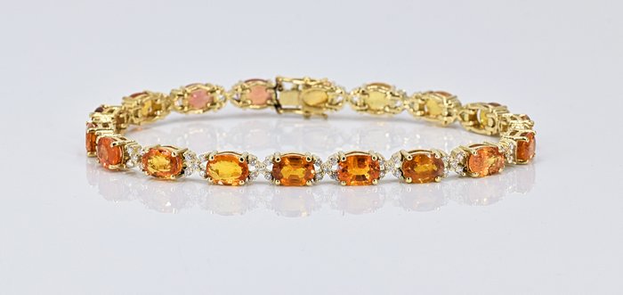 Armbånd - 18 kraat Gulguld -  18.10ct. tw. Safir - Diamant