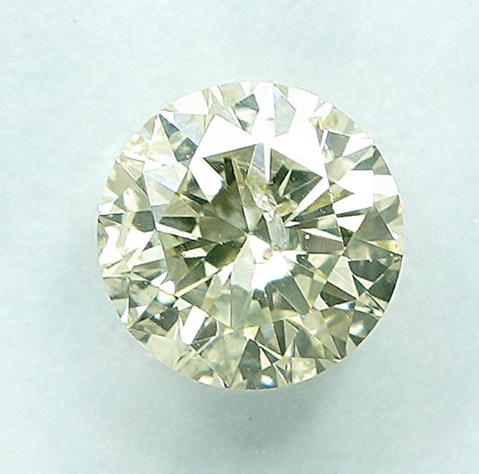 1 pcs Diamant  (Naturfarvet)  - 0.62 ct - Light Gul - I1 - International Gemological Institute (IGI)