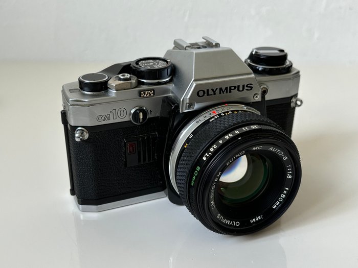 Olympus, Vivitar, Schneider Kreuznach OM-10 +  1:1,8 f=50mm(2x) Analogt kamera