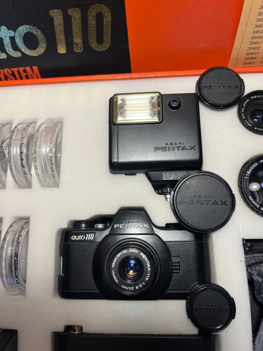 Pentax Auto 110 SLR system compleet in doos mit 18mm, 24mm, 50mm, motor en flitser! | Subminiature kamera