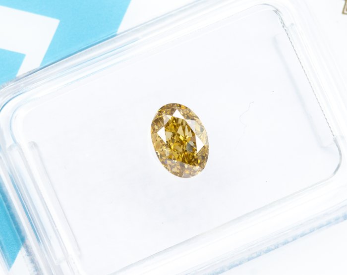 Ingen mindstepris - 1 pcs Diamant  (Naturfarvet)  - 0.70 ct - Oval - Fancy intense Brun Gul - SI1 - International Gemological Institute (IGI)