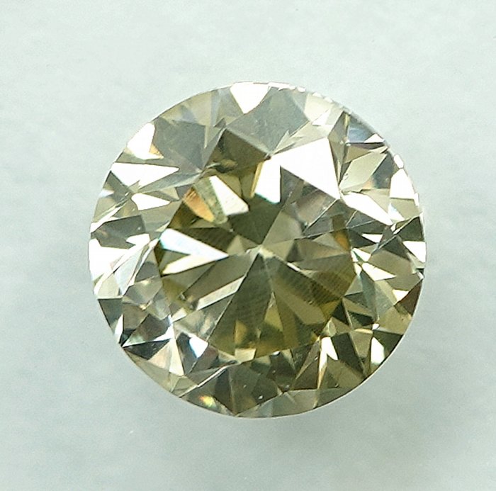 1 pcs Diamant  (Naturfarvet)  - 0.54 ct - Fancy light Grålig Gul - VS2 - International Gemological Institute (IGI)