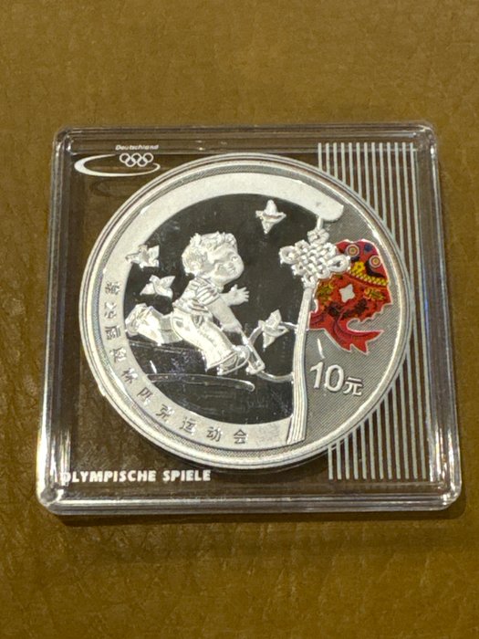 Kina. 10 Yuan 2008 'Junge beim Reifenrollen', 1 Oz (.999)  (Ingen mindstepris)