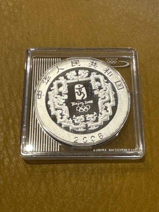 Kina. 10 Yuan 2008 'Junge beim Reifenrollen', 1 Oz (.999)  (Ingen mindstepris)