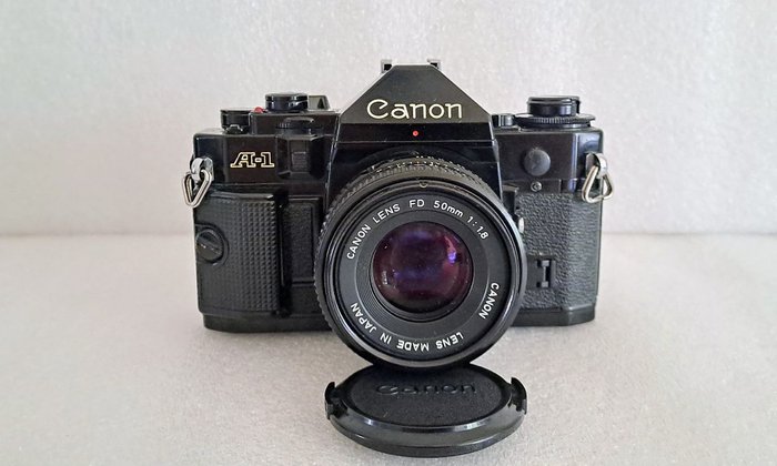 Canon A1 + Canon 28mm 1:2.8 + Canon 50mm 1:1.8 + Canon Power Winder A + accessoires Analogt kamera