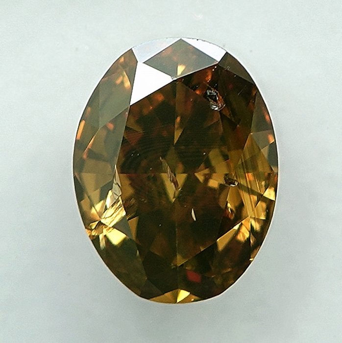 Ingen mindstepris - 1 pcs Diamant  (Naturfarvet)  - 0.72 ct - Oval - Fancy Brunlig, Grønlig Gul - I1 - International Gemological Institute (IGI)