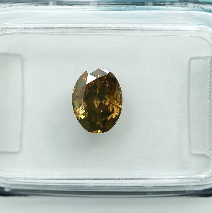 Ingen mindstepris - 1 pcs Diamant  (Naturfarvet)  - 0.72 ct - Oval - Fancy Brunlig, Grønlig Gul - I1 - International Gemological Institute (IGI)