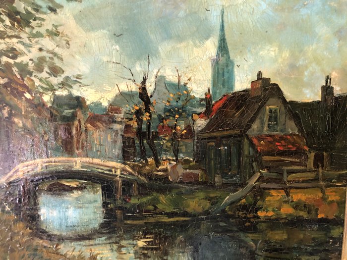 Hollandse School(XX) Martin van Waning (1889-1972), Circle of - Stadsgezicht met brug en figuren