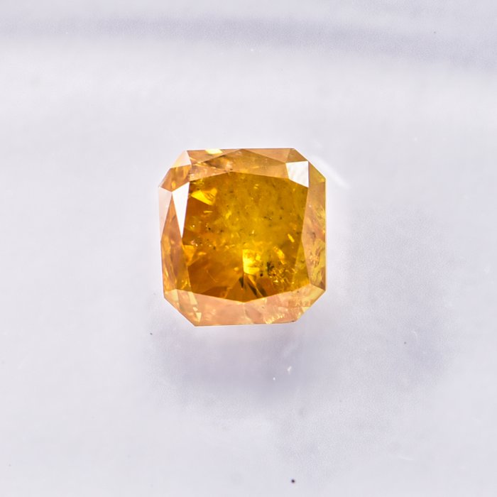 Ingen mindstepris - 1 pcs Diamant  (Naturfarvet)  - 0.57 ct - Radiant - Fancy intense Gullig Orange - I3 - International Gemological Institute (IGI)