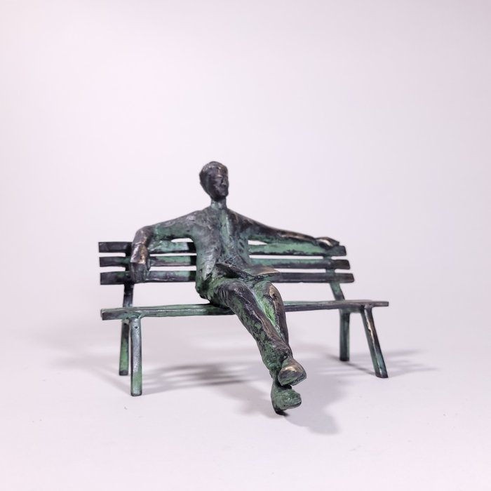 J. Chol - Reader on the bench (Bronze sculpture - limited)