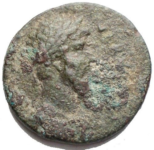 Corinthia Korinth Lucius Verus (AD 161-169) Æ - Melikertes-Palaimon lriding on back of dolphin swimming left within pinewreath