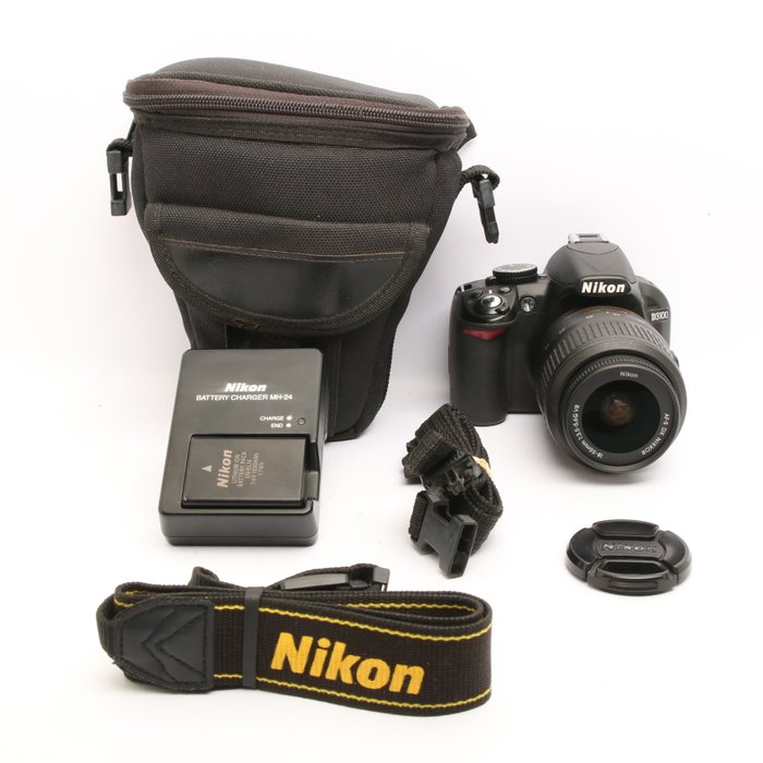 Nikon D3100 + Nikon 18-55mm VR lens + snuittas Digitalt refleks kamera (DSLR)