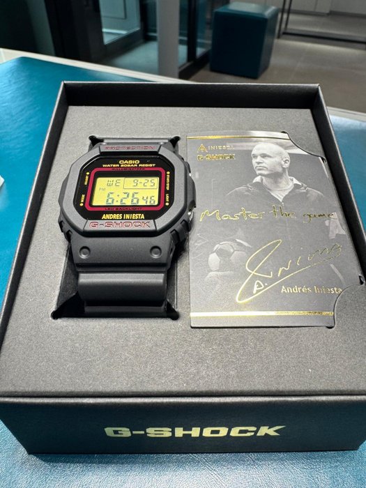 G-Shock - Andrés Iniesta X Casio G-Shock - Ingen mindstepris - DW-5600AI- 1ER - Unisex - 2020+