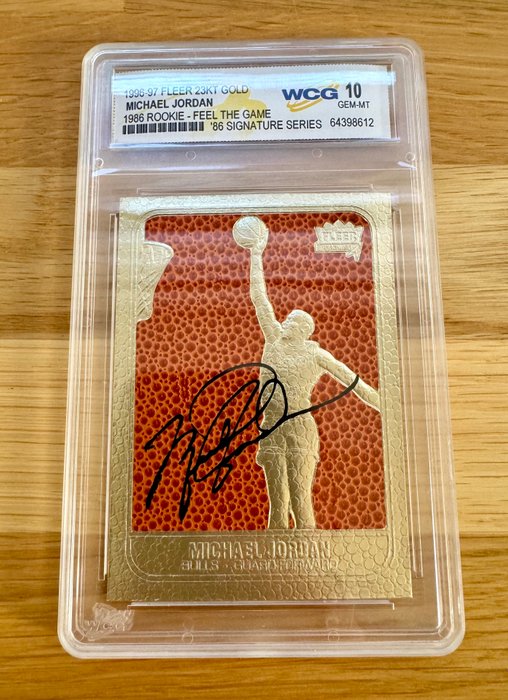 1996/97 Fleer 23KT Gold Michael Jordan 1986 Rookie Feel The Game Signature Series WCG 10 Graded card