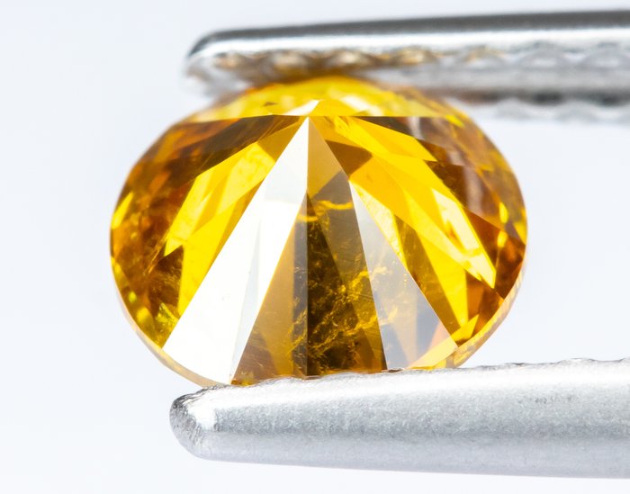 Ingen mindstepris - 1 pcs Diamant  (Naturfarvet)  - 0.71 ct - Rund - Fancy vivid Orange - I1 - Gem Report Antwerp (GRA)