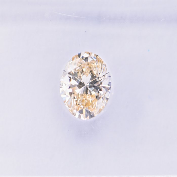 Ingen mindstepris - 1 pcs Diamant  (Naturfarvet)  - 046 ct - Oval - Light Brun Gul - SI1 - International Gemological Institute (IGI)