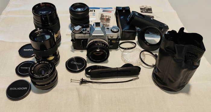 Canon AE-1 + 50mm/28-70mm/28mm/135mm/200mm Reflekskamera med enkelt linse (SLR)