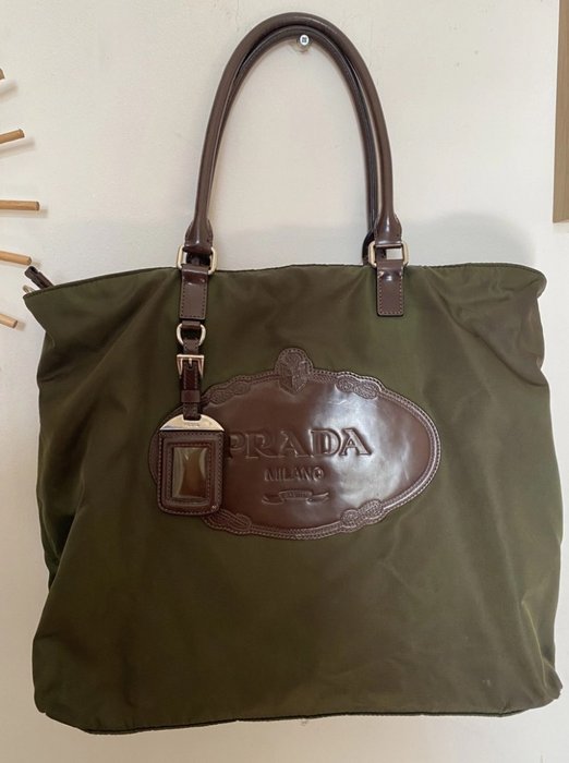 Prada - Prada nylon crossbody bag with leather patch and travel tag - Håndtaske