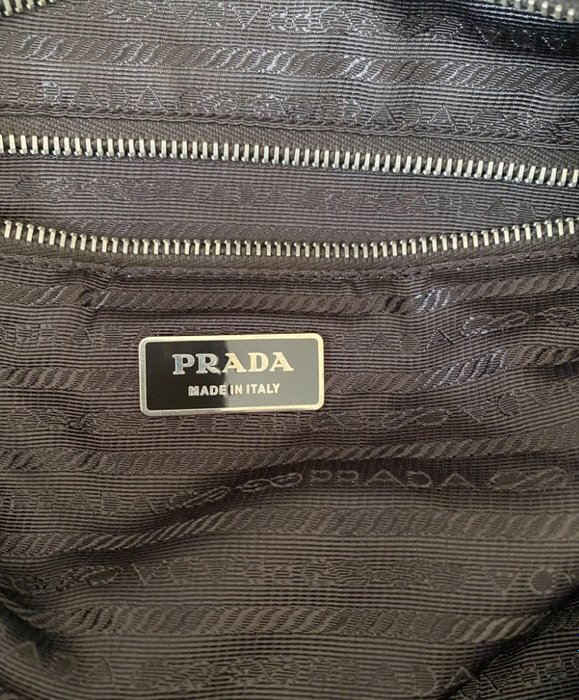 Prada - Prada nylon crossbody bag with leather patch and travel tag - Håndtaske