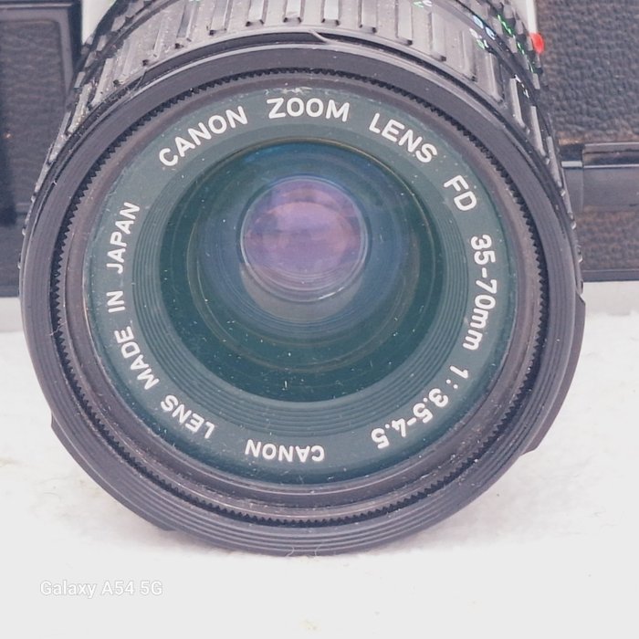 Canon AT-1 + Zoom FD 3.5-4.5/35-70mm Reflekskamera med enkelt linse (SLR)