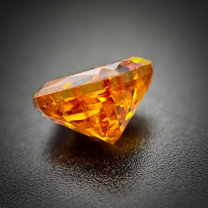 1 pcs Diamant - 0.50 ct - skåret rektangulært hjørne - fancy intens orange yellow - I1