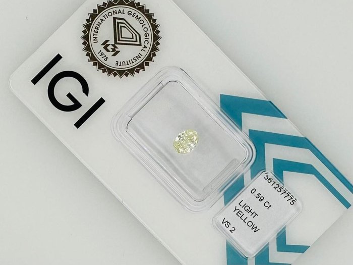 1 pcs Diamant  (Naturfarvet)  - 0.59 ct - Oval - Light Gul - VS2 - International Gemological Institute (IGI)