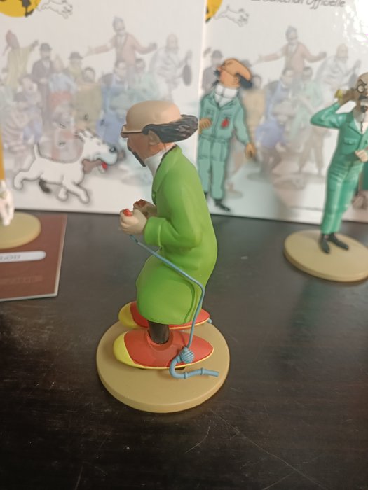 Tintin - 4 figurines 3 differente de tournesol + milou herge avec cert et livres