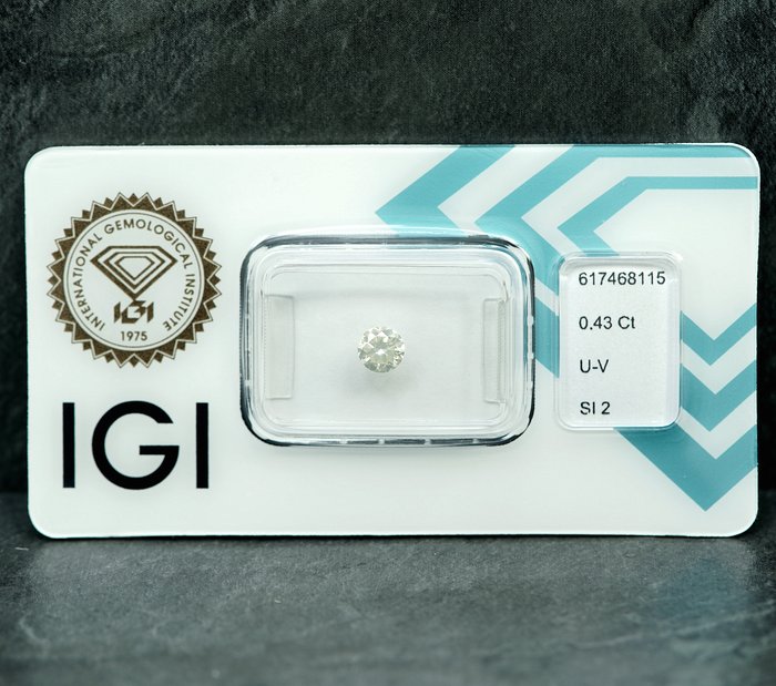 1 pcs Diamant  (Naturfarvet)  - 043 ct - Light Grålig Gul - SI2 - International Gemological Institute (IGI)