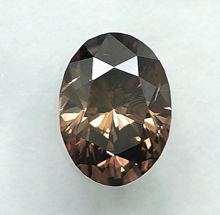 1 pcs Diamant  (Naturfarvet)  - 058 ct - Oval - Fancy Orange nuance Brun - SI1 - International Gemological Institute (IGI)