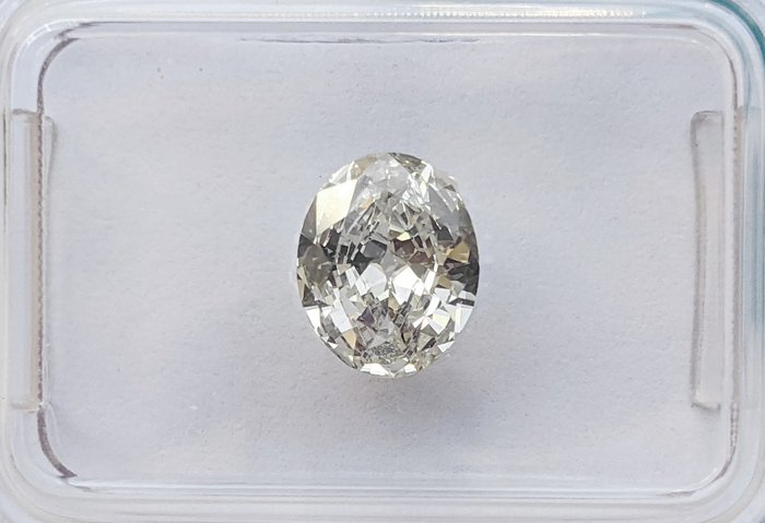 1 pcs Diamant  (Natur)  - 1.00 ct - Oval - K - SI1 - International Gemological Institute (IGI)