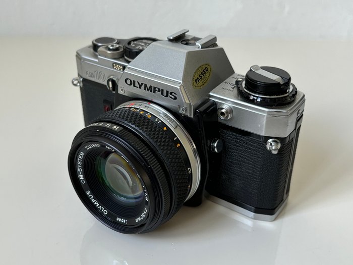 Olympus, Vivitar, Schneider Kreuznach OM-10 +  1:1,8 f=50mm(2x) Analogt kamera