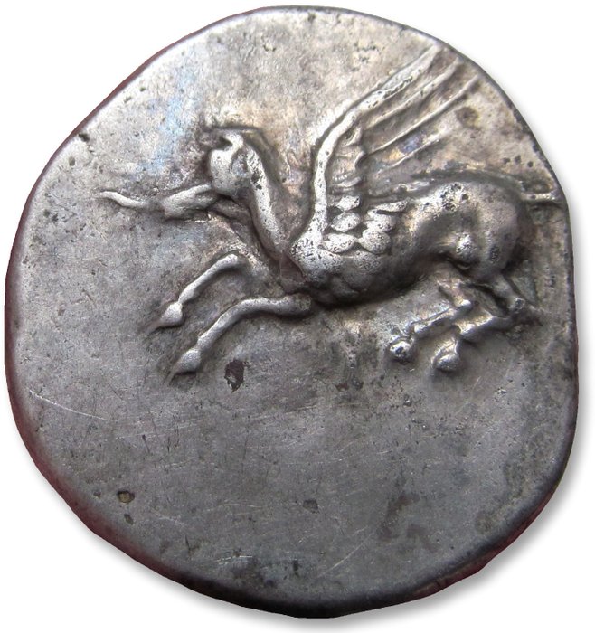 Corinthia Korinth Stater circa 405-345 BC - dolphin  rooster picking ground symbol scarcer variety -