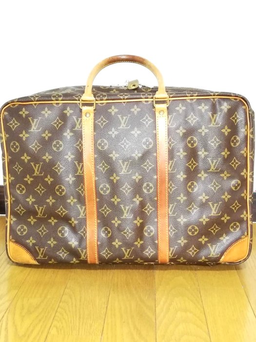 Louis Vuitton - sirius - Håndtaske