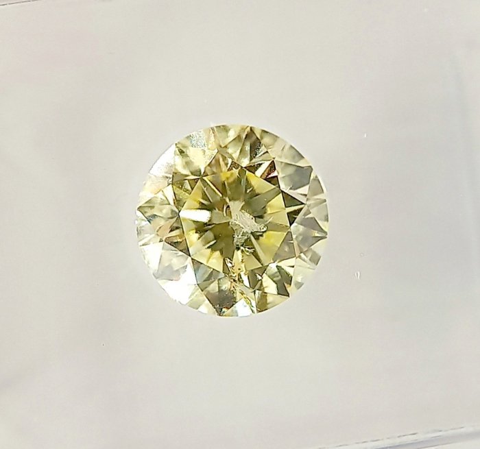 Ingen mindstepris - 1 pcs Diamant  (Naturfarvet)  - 1.02 ct - Rund - Light Grønlig Gul - I1 - Antwerp Laboratory for Gemstone Testing (ALGT)