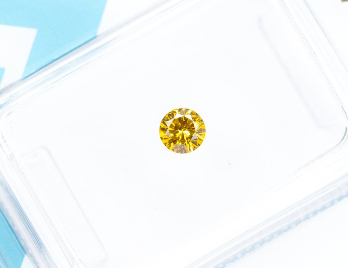 Ingen mindstepris - 1 pcs Diamant  (Naturfarvet)  - 0.17 ct - Rund - Fancy vivid Brunlig, Gul - SI1 - International Gemological Institute (IGI)