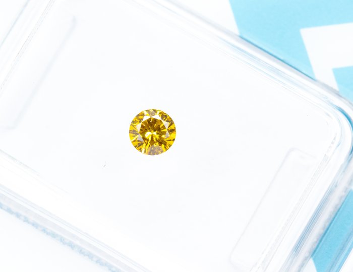 Ingen mindstepris - 1 pcs Diamant  (Naturfarvet)  - 0.17 ct - Rund - Fancy vivid Brunlig, Gul - SI1 - International Gemological Institute (IGI)