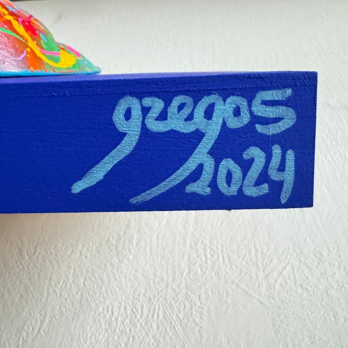 Gregos (1972) - Multicolored kiss on blue background