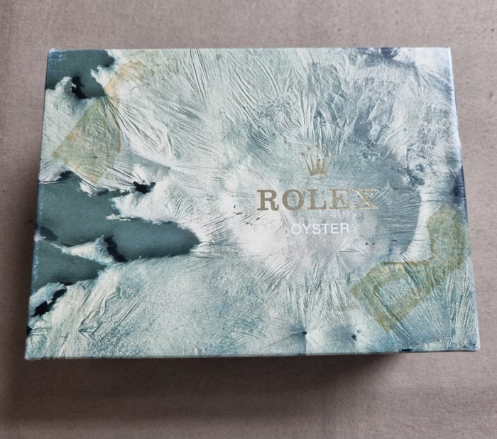 Rolex - vintage moon crater green leather box ref.68.00.55/out box stickers 68273