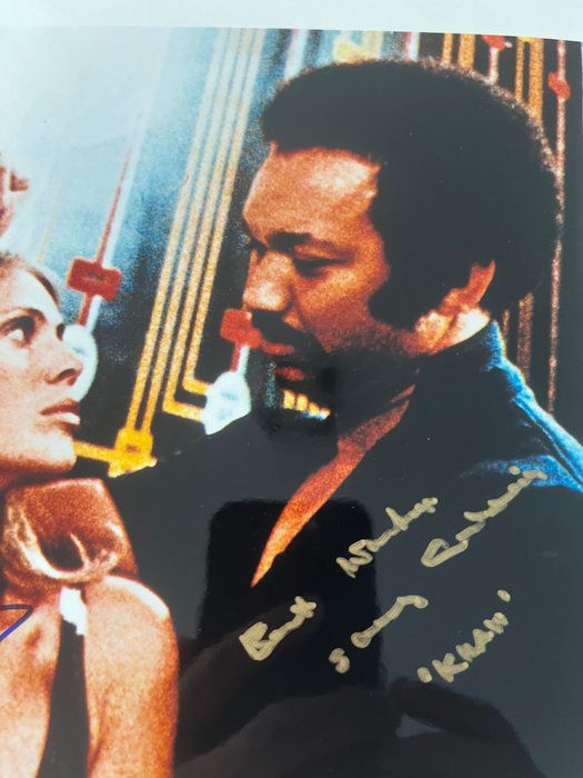 James Bond 007: The Man with the Golden Gun Double signed Britt Ekland as "Mary Goodnight" and Sonny Caldinez as "Kra" with B'BC holographic COA