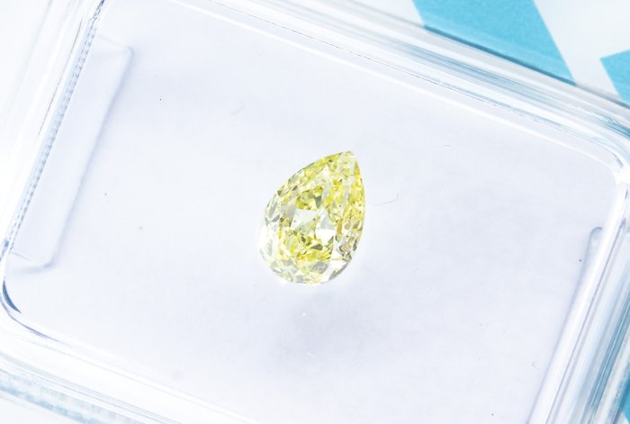 Ingen mindstepris - 1 pcs Diamant  (Naturfarvet)  - 0.54 ct - Pære - Fancy light Gul - SI1 - International Gemological Institute (IGI)