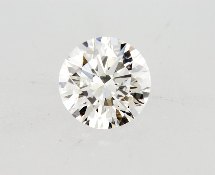 1 pcs Diamant  (Natur)  - 0.59 ct - Rund - J - VS1 - Gemological Institute of America (GIA) - e11