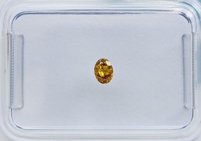 Ingen mindstepris - 1 pcs Diamant  (Naturfarvet)  - 0.12 ct - Oval - Fancy intense Gul Orange - VS2 - International Gemological Institute (IGI)