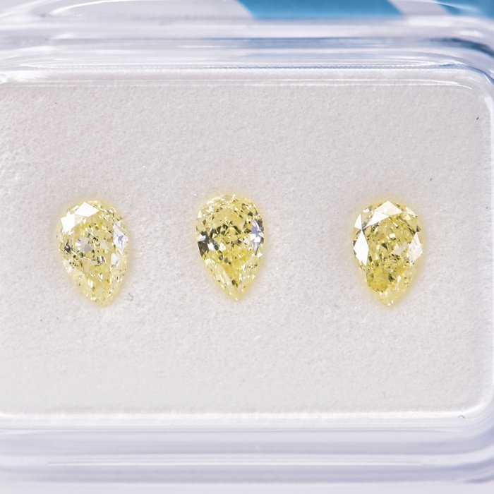 Ingen mindstepris - 3 pcs Diamant  (Naturfarvet)  - 0.69 ct - Pære - Fancy Gul - I1, SI2 - International Gemological Institute (IGI)