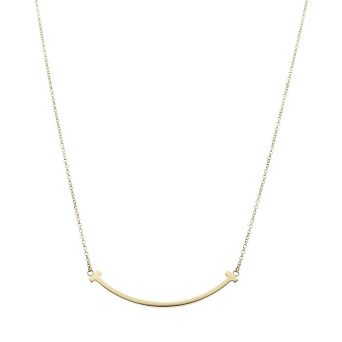 Tiffany  Co. - Halskæde - T Smile Mini Necklace 60011679 - 18 kraat Gulguld