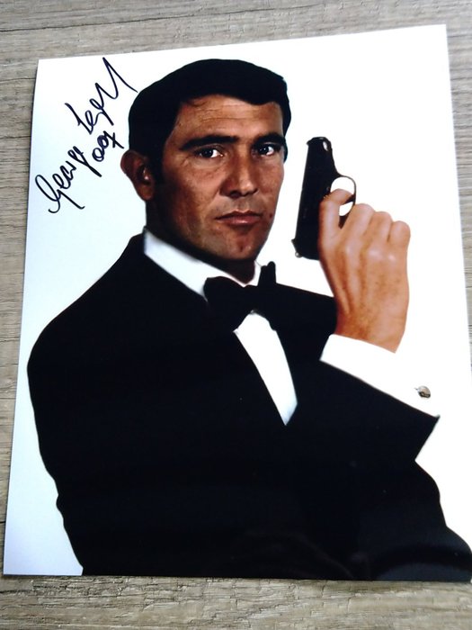 James Bond 007: On Her Majesty’s Secret Service - George Lazenby in classic Bond pose - Signed photo with COA