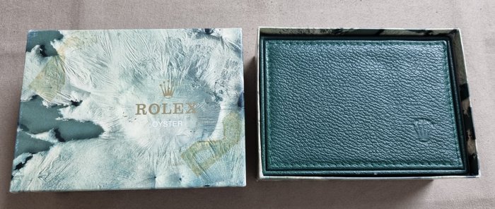 Rolex - vintage moon crater green leather box ref.68.00.55/out box stickers 68273