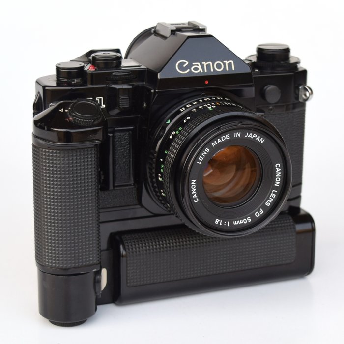 Canon A-1  + FD 18/50mm SC met motordrive Reflekskamera med enkelt linse (SLR)