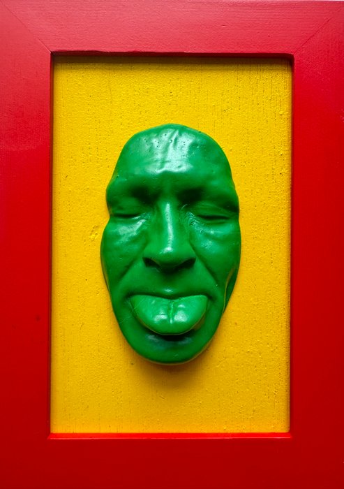 Gregos (1972) - Small green mockery on yellow background-red frame