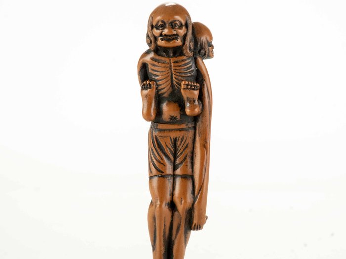 En stor, usædvanlig buksbom netsuke, der forestiller Ashinaga, der bærer Tenaga - Japan - Edo-perioden (1600-1868)